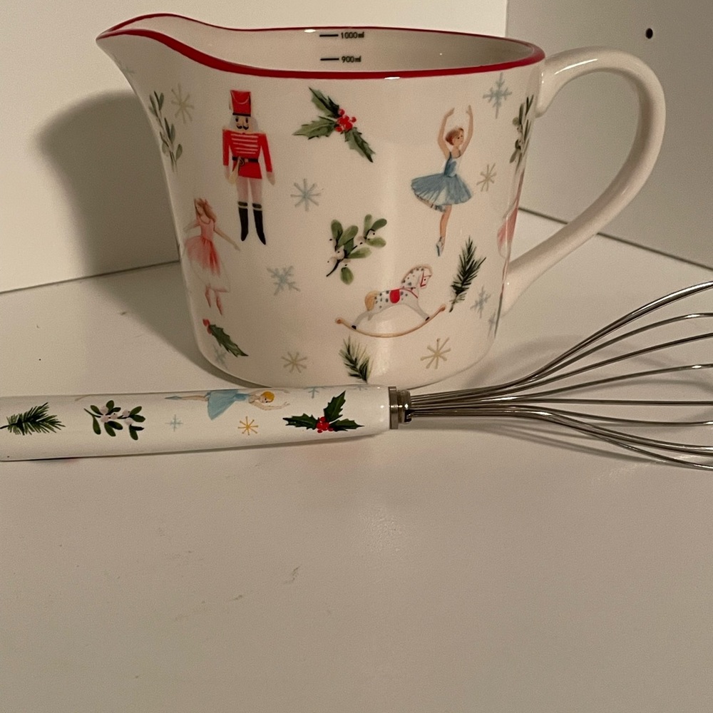 The bake shop measuring cup with matching whisk